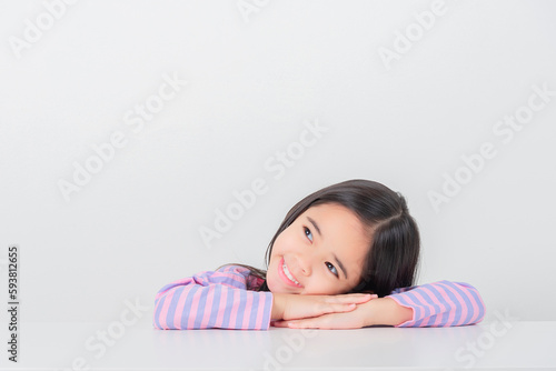 Image of Asian child posing on white  background