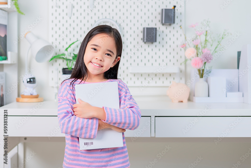 education and school concept - little student girl reading book education and school concept - little student girl reading book