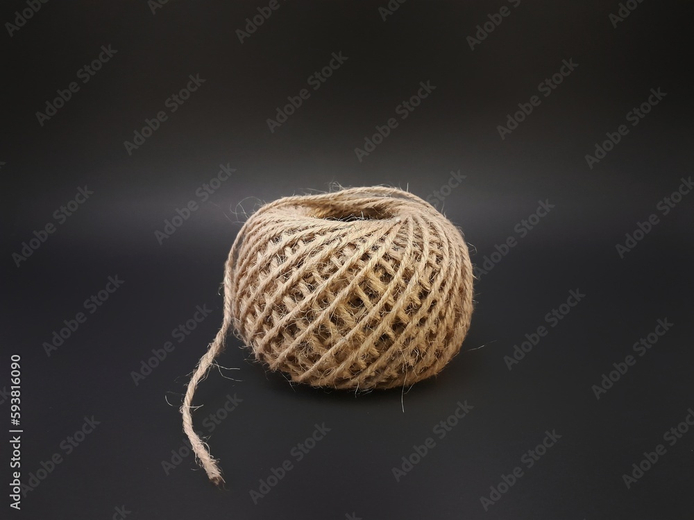 A roll of brown small hemp rope burlap straw rope coir fiber rope