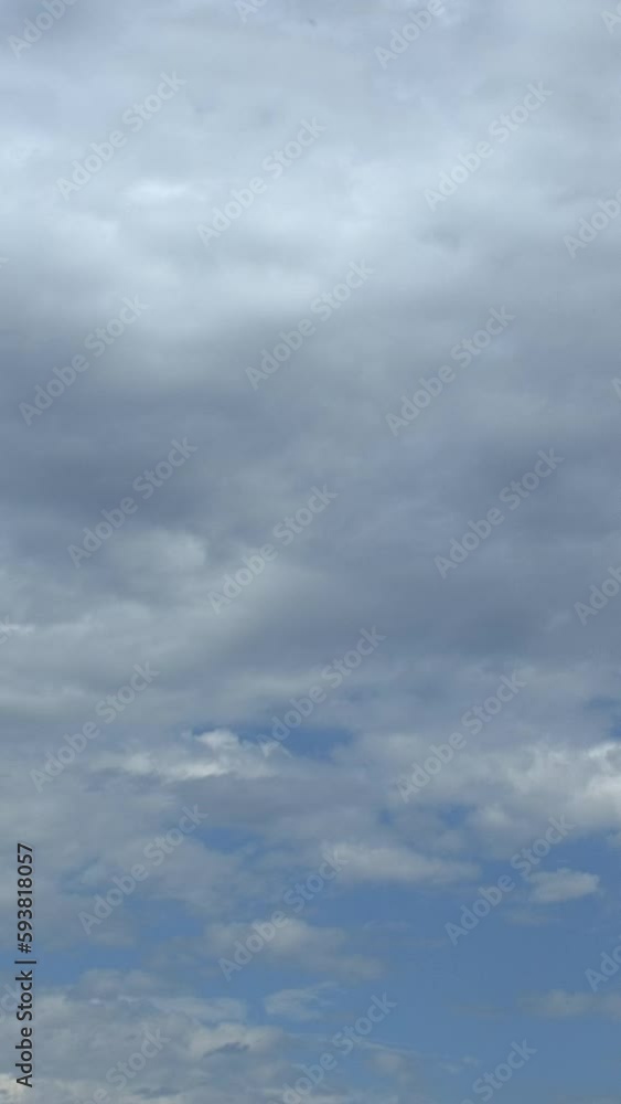 Cloudy sky before storm vertical video time lapse on a cloudy day. Cloudy sky before storm vertical video time lapse on a cloudy day.