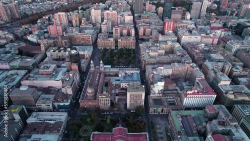 Establishing aerial view high above Santiago, Chile, Chamber of Deputies, Courts of Justice and Plaza de Armas historical city landscape