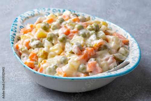Russian salad Olivier with mayonnaise and egg served (Turkish name; Rus salatasi)