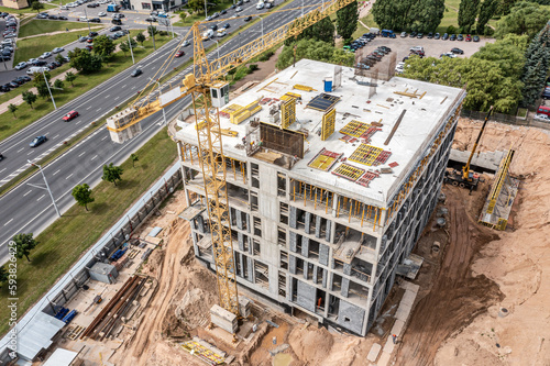 new office building under construction. aerial view of construction site on sunny summer day. © Mr Twister