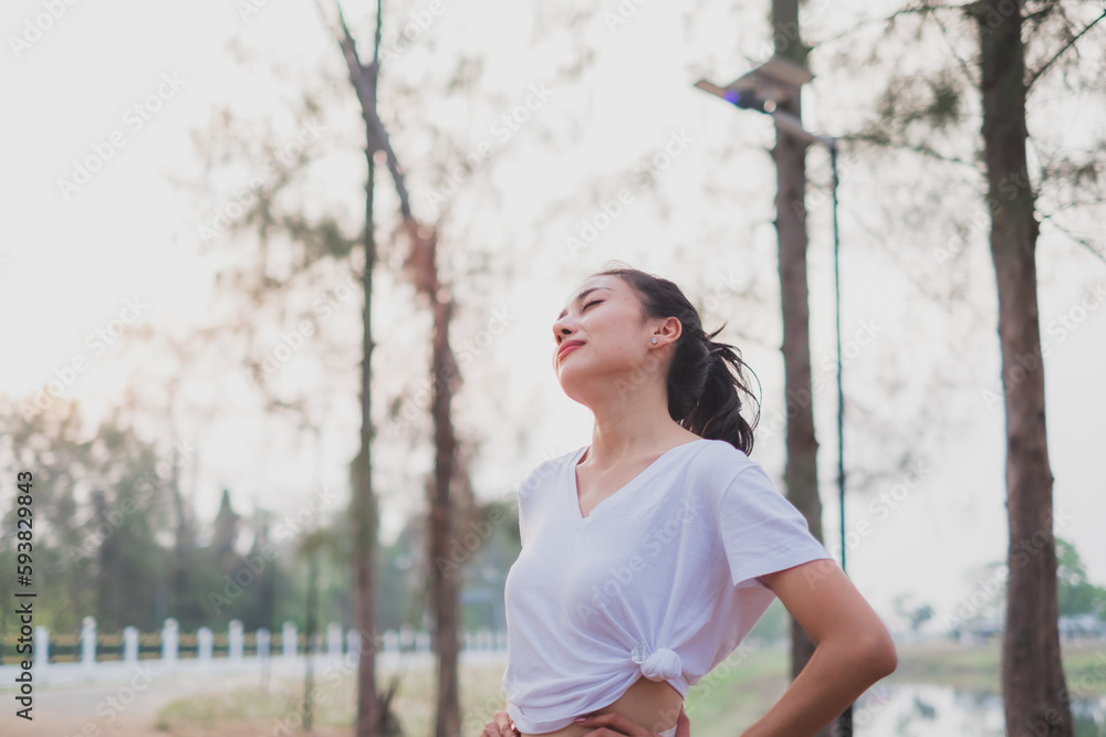 A concept of smiling female happy with life having inspiration, stretching, freedom, deep breath fresh air, positive, wellbeing, dreaming, euphoria, carefree, joy, spirit, celebrate life. Clam happy A concept of smiling female happy with life having inspiration, stretching, freedom, deep breath fresh air, positive, wellbeing, dreaming, euphoria, carefree, joy, spirit, celebrate life. Clam happy