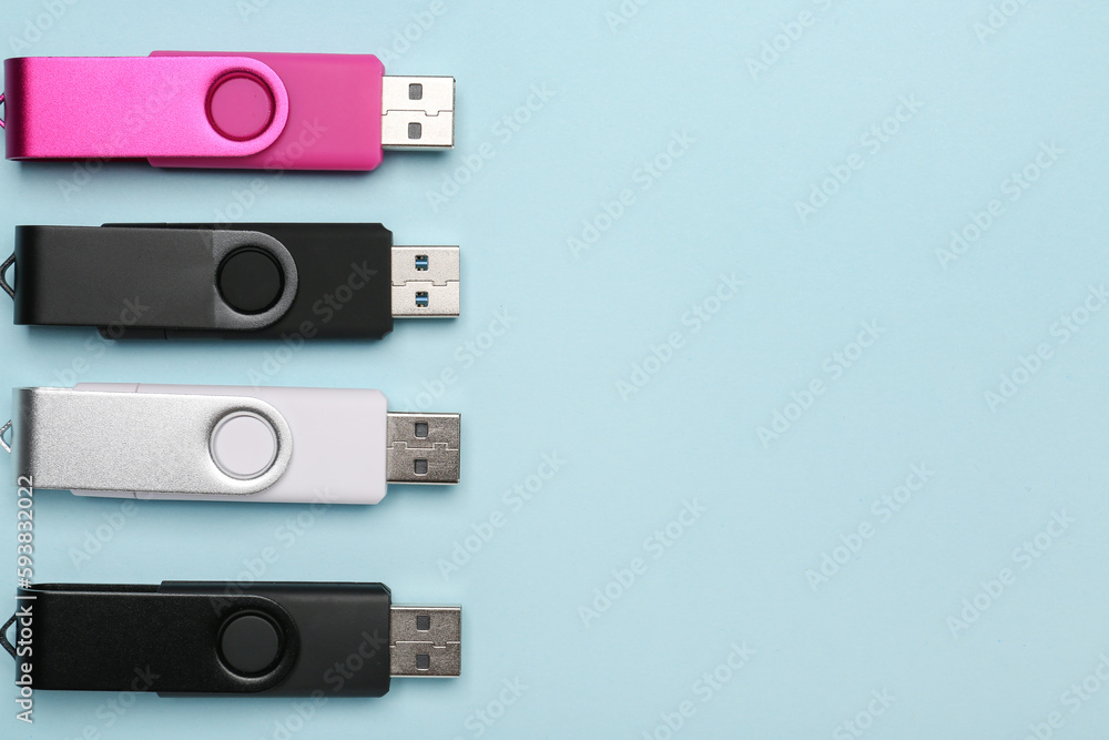 Obraz premium USB flash drives on blue background