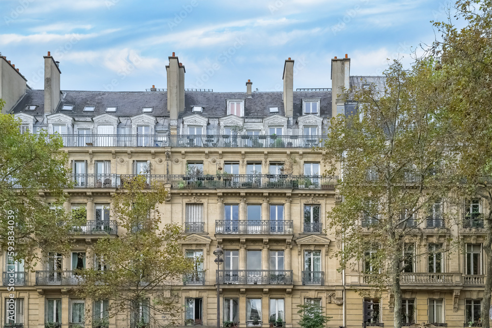 Paris, typical facade in autumn, building boulevard Richard-Lenoir, in the 11e arrondissement
