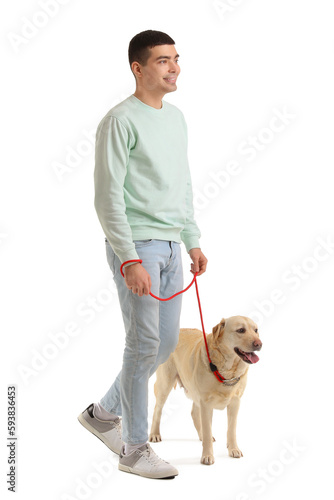 Young man with cute Labrado...