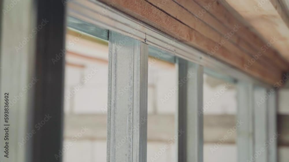 Frame made of galvanized metal beams for drywall, close-up Frame made of galvanized metal beams for drywall, close-up