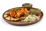 A plate of chicken tandoori with naan bread