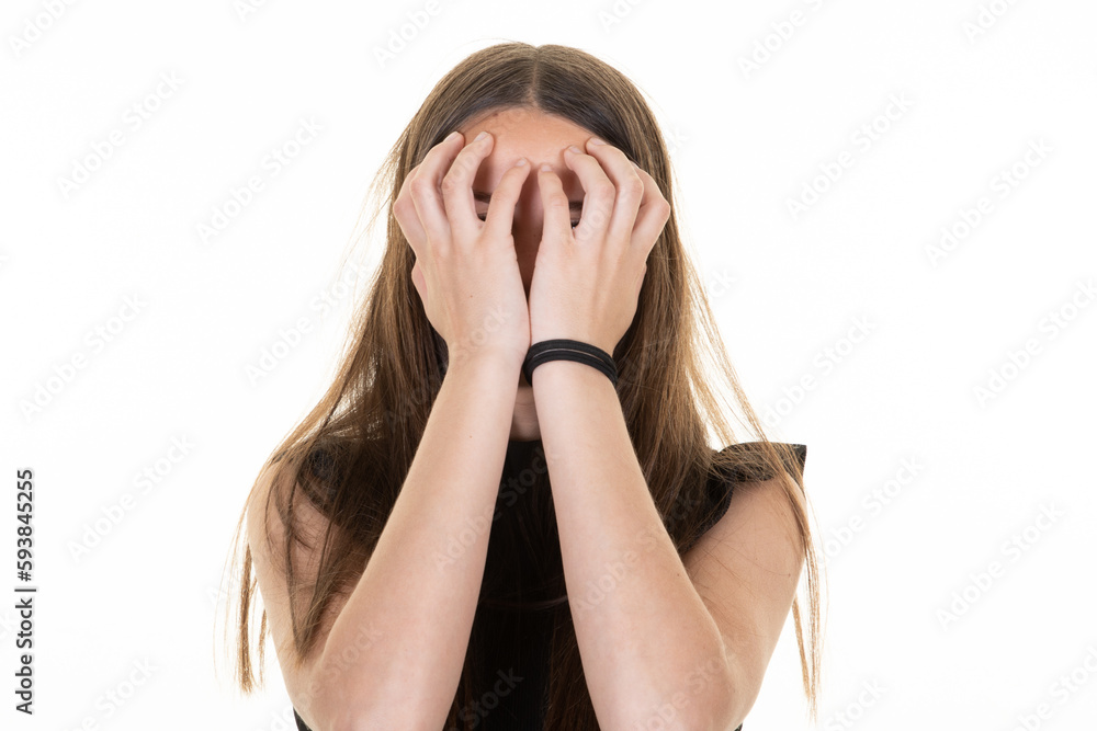 portrait young woman hiding covering eyes face with hands portrait young woman hiding covering eyes face with hands