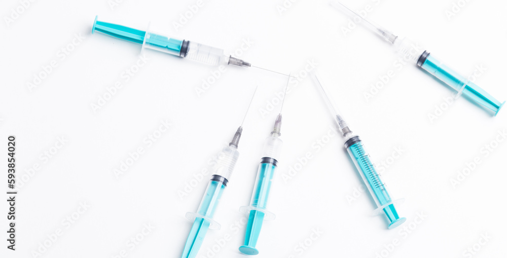 Disposable plastic syringe prepared for injection and vaccination in the hospital. The concept of medicine and health Disposable plastic syringe prepared for injection and vaccination in the hospital. The concept of medicine and health