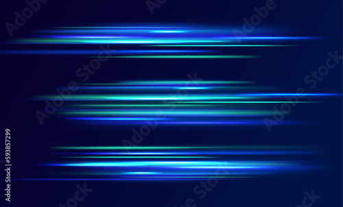 The effect of speed on a blue background. Abstract light lines of movement and speed with white color glitters.