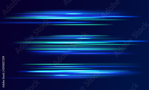 The effect of speed on a blue background.  Abstract light lines of movement and speed with white color glitters.