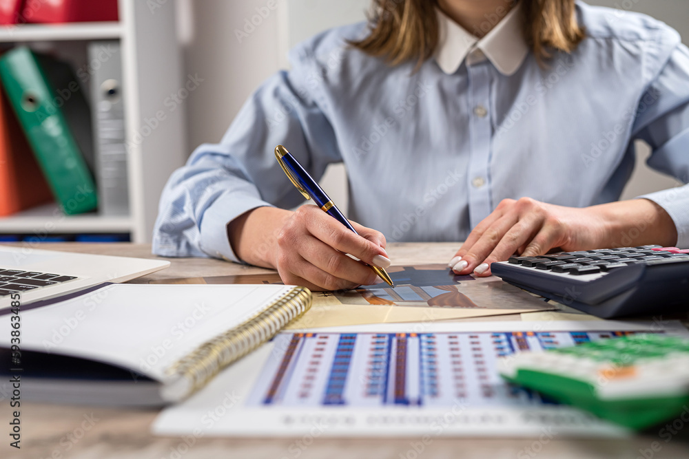 designer woman working blueprint architectural project and tools at office desk designer woman working blueprint architectural project and tools at office desk