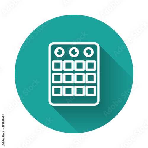 White line Drum machine icon isolated with long shadow. Musical equipment. Green circle button. Vector