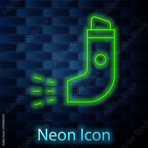 Glowing neon line Inhaler icon isolated on brick wall background. Breather for cough relief, inhalation, allergic patient. Vector