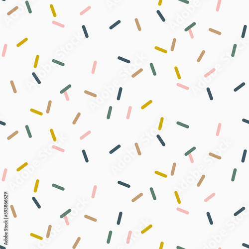 Colorful abstract confetti sprinkles seamless pattern background.