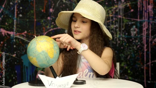 Young girl Freelancer Choos a Place Travel.