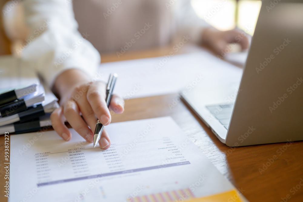 Small business accounting Businesswoman Accountant verify growing business with calculator. Accountancy Concept. Small business accounting Businesswoman Accountant verify growing business with calculator. Accountancy Concept.