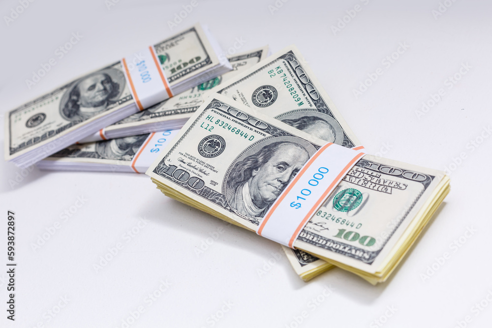 Set of a packs of dollars with a rubber band isolated on a white background Set of a packs of dollars with a rubber band isolated on a white background