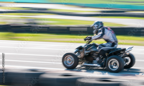 Unrecognised  man driving Go-kart with speed in the on a karting track © Michalis Palis