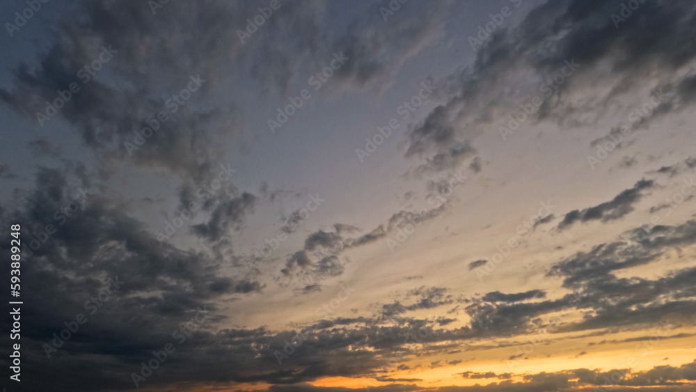 pretty dark evening sundown skyscape with beautiful clouds - photo of nature