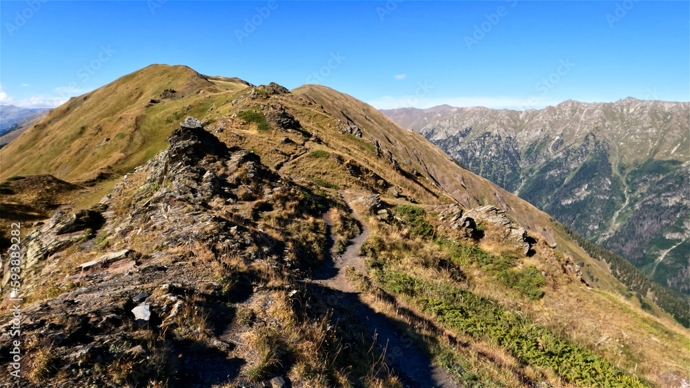 mountain ridge rough hiking earth road with no asphalt - photo of nature