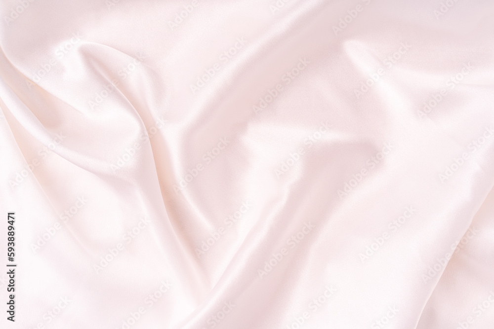 Background of white crumpled tulle close-up. Background of white crumpled tulle close-up.