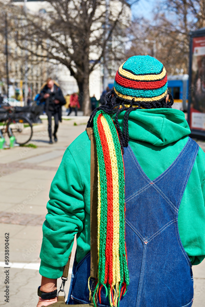 Man in reggae style clothes on street