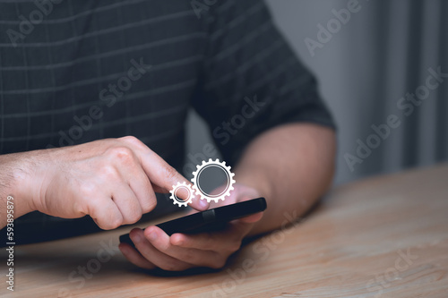 Фотография Man press smartphone for setting,Set up application for smart home,Install progr