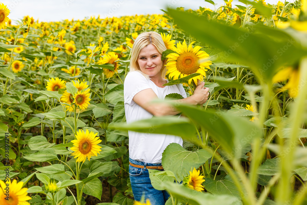 smiling woman in sunflower field nature sun agriculture. smiling woman in sunflower field nature sun agriculture.