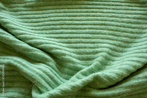 green knitted fabric sweaters