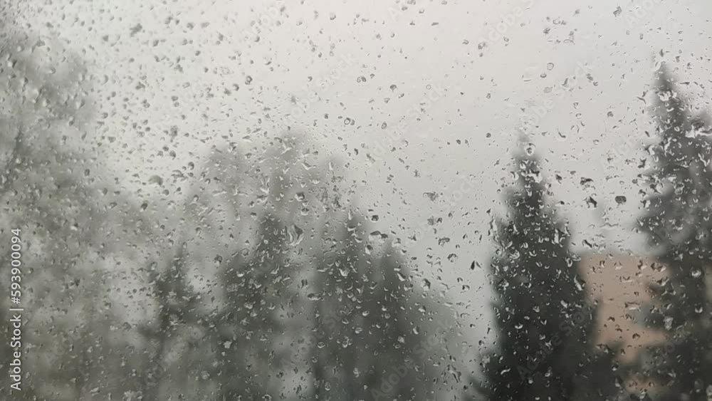 Water drops on the window surface. Water drops on the window surface.