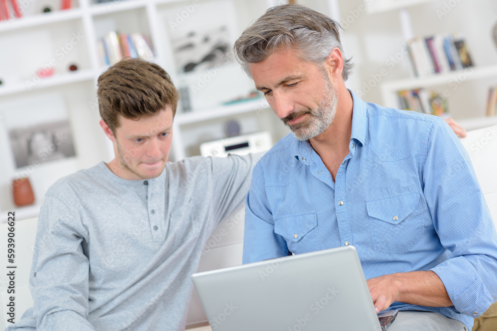 father and son with technology father and son with technology