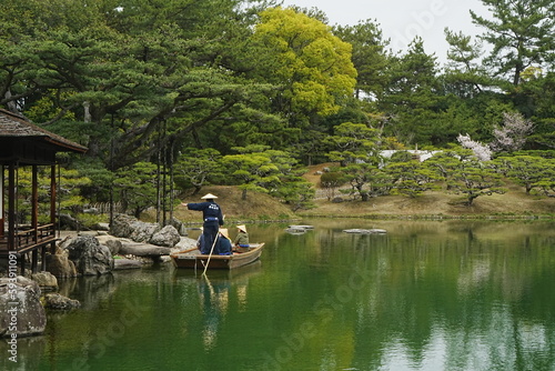 Traditional Japanese Boat on Pond and Japanese Garden at Ritsurin Garden Park in Takamatsu, Kagawa, Japan - 日本 香川 高松 栗林公園 日本庭園 池 和船
