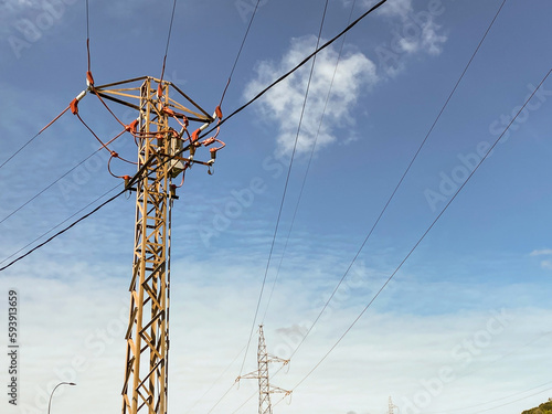 Electric power tower on the outskirts of the city. Copy space.