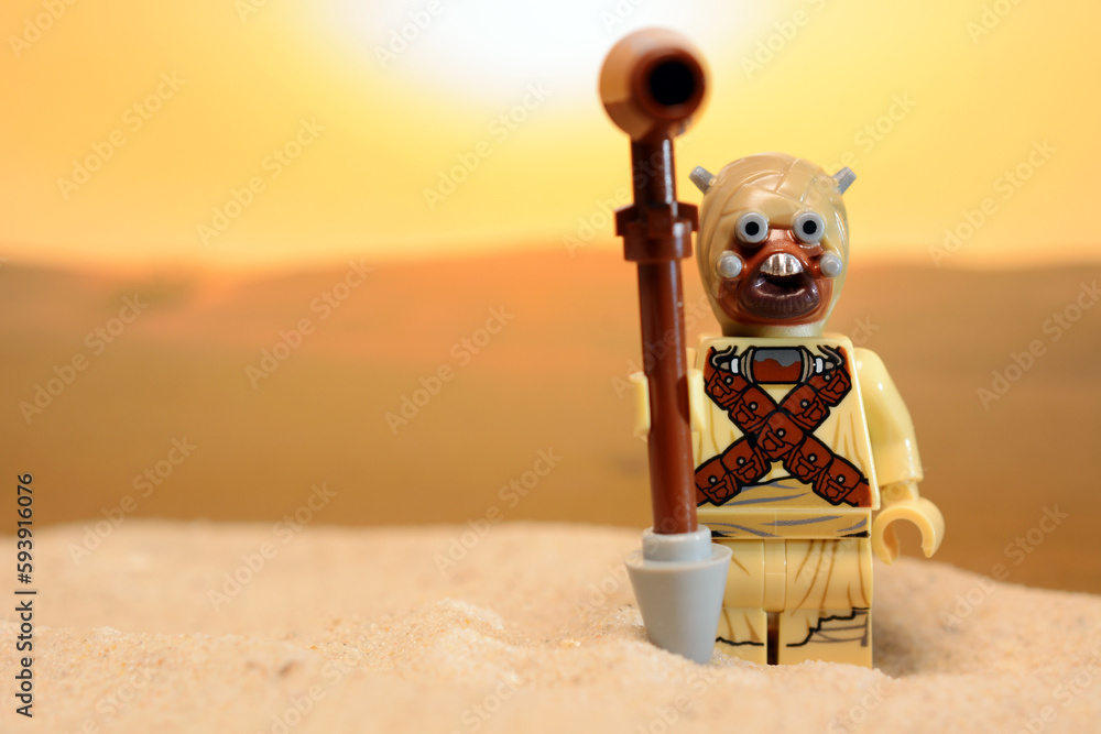 Fototapeta premium Lego Star Wars figure Sand People Tusken Raider stands on the desert planet Tatooine
