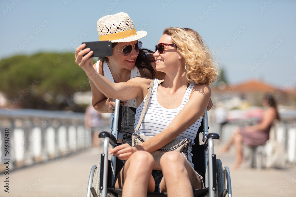 disable and wheelchair woman with sister during holidays