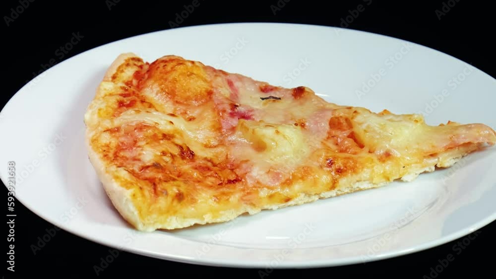 Pizza spinning on a plate Pizza spinning on a plate