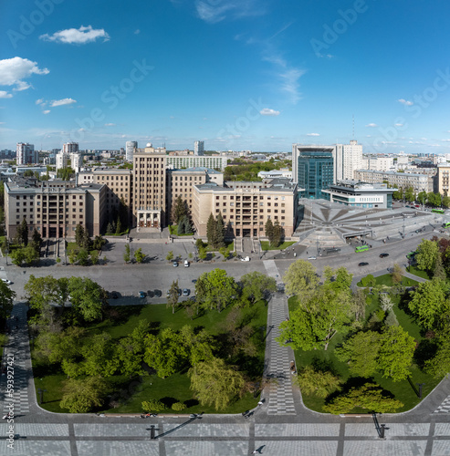 City aerial panoramic view on Karazin National University northern building with greenery and blue sky in spring Kharkiv, Ukraine