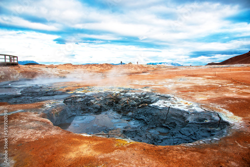 Magical dramatic scene with geothermal swamp and volcanoes in Hverir (Hverarond) valley in the Myvatn region. Iceland. Exotic countries. Amazing places.