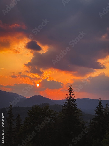 colorful sunset on top of ukrainian mountain