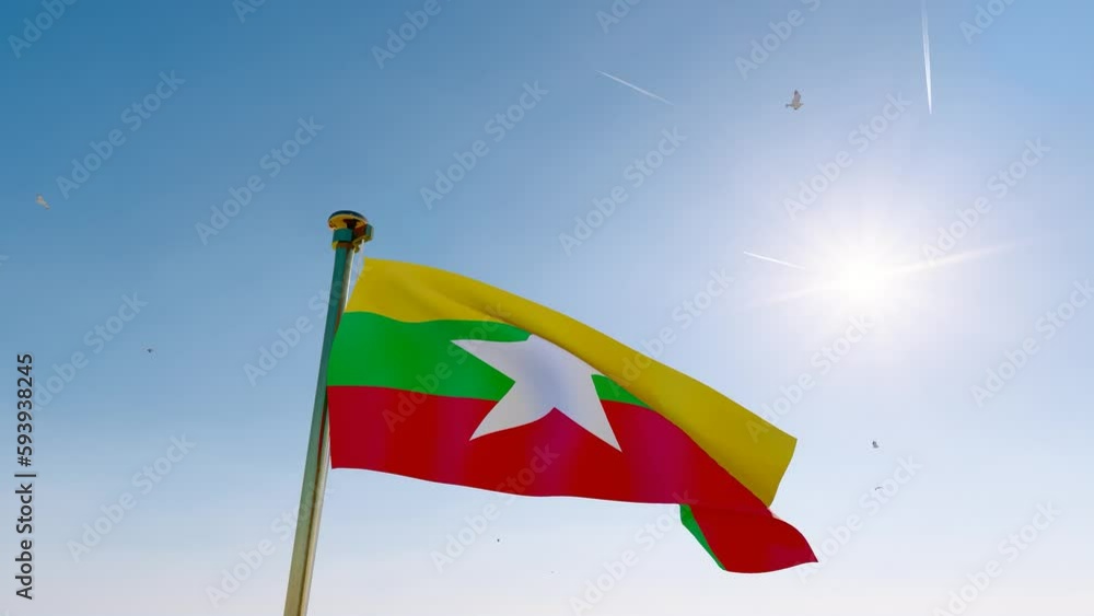 Burma national flag waving in beautiful blue sky. Flag of Burma waving ...