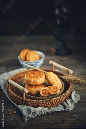 Sesame meat muffins, traditional handmade food, dark background