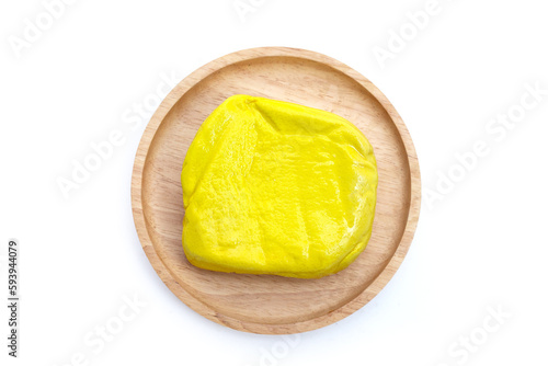 Yellow tofu on white background.