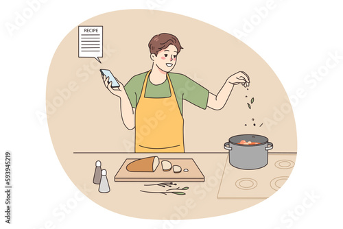 Smiling man cooking soup at home kitchen follow recipe on smartphone screen. Happy male chef prepare delicious food for dinner with online instruction on cellphone. Vector illustration.