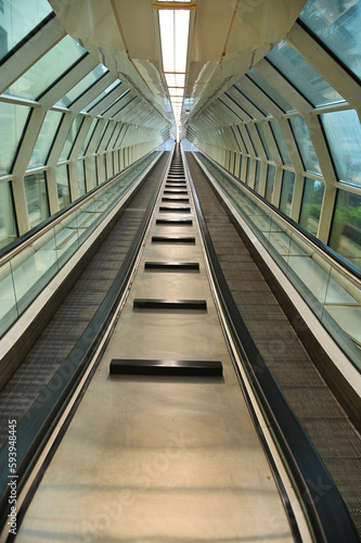 Deserted double way escalator tunnel perspective view © antomar