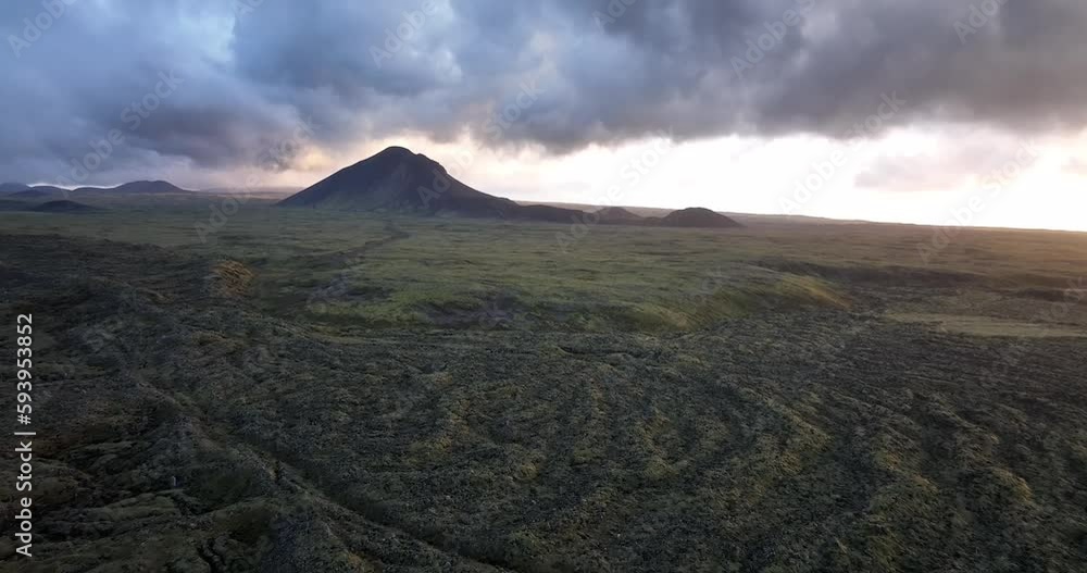 Panning shot across a field of moss covered rocks in south Iceland
