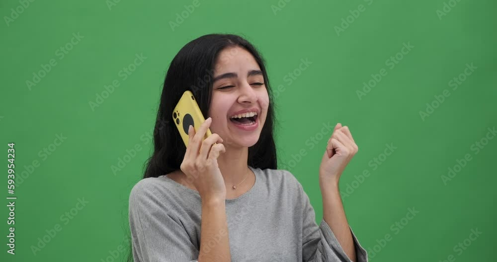 Woman laughing while talking on mobile phone Woman laughing while talking on mobile phone
