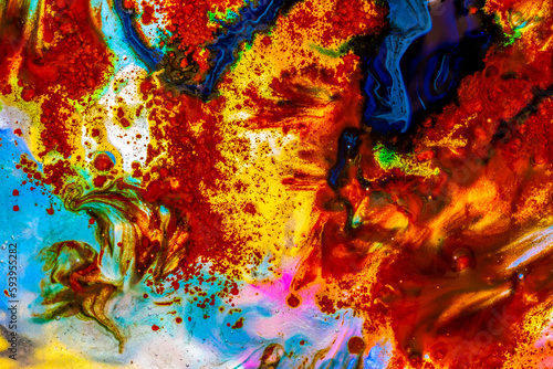 Colored paint on the water surface. Abstract patterns.